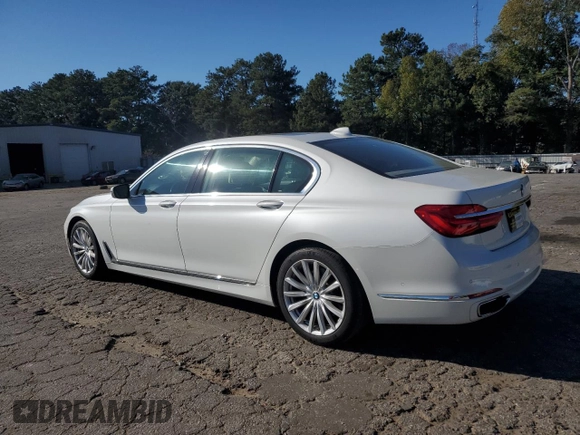2016 BMW 7 Series 740i with VIN WBA7E2C54GG547970, listed as a Copart auction lot 71097393 with 60,464 mi miles. Bid and sale history available at carsss.com. Image 2.