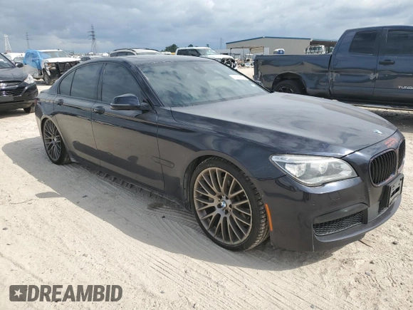 2015 BMW 7 Series 750i with VIN WBAYA8C59FG197642, listed as a Copart auction lot 70282884 with 130,853 mi miles and Salvage title. Bid and sale history available at DreamBid. Image 4.