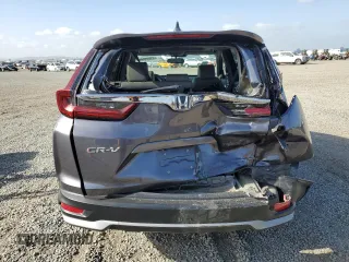 2020 Honda CR-V EX-L with VIN 2HKRW1H87LH428290, listed as a Copart auction lot 77001044 with 51,871 mi miles and Salvage Title. Bid and sale history available at carsss.com. Image 6.