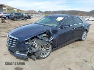 2016 Cadillac CTS Luxury Collection AWD with VIN 1G6AX5SX2G0176665, listed as a IAAI auction lot 41793579 with 67,985 mi miles and . Bid and sale history available at DreamBid. Image 2.