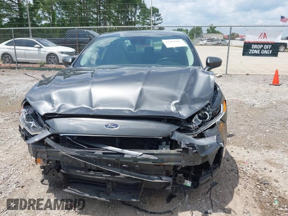 2020 Ford Fusion SE z VIN 3FA6P0HD6LR160147, wystawiony jako IAAI lot #42499983 z przebiegiem 73 971 mil mil oraz . Historia ofert i sprzedaży dostępna na DreamBid. Obrazek 6.