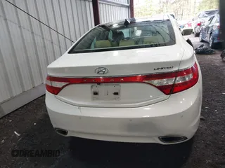 2014 Hyundai Azera Limited with VIN KMHFH4JG7EA378755, listed as a IAAI auction lot 42027136 with 216,082 mi miles and . Bid and sale history available at carsss.com. Image 16.