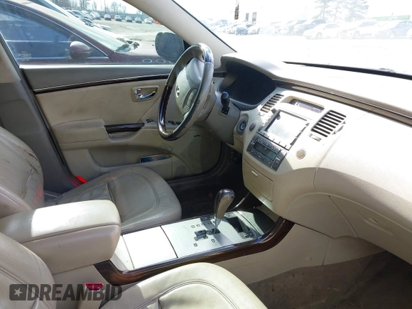 2009 Hyundai Azera Limited z VIN KMHFC46F59A428900, wystawiony jako IAAI lot #41234438 z przebiegiem 258 219 mil mil oraz . Historia ofert i sprzedaży dostępna na DreamBid. Obrazek 5.