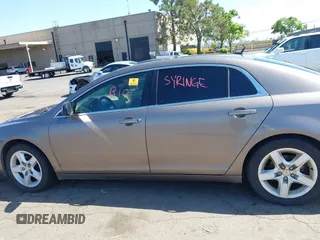 2011 Chevrolet Malibu 1LS with VIN 1G1ZB5E1XBF215846, listed as a IAAI auction lot 42153073 with Not Provided miles and . Bid and sale history available at DreamBid. Image 14.