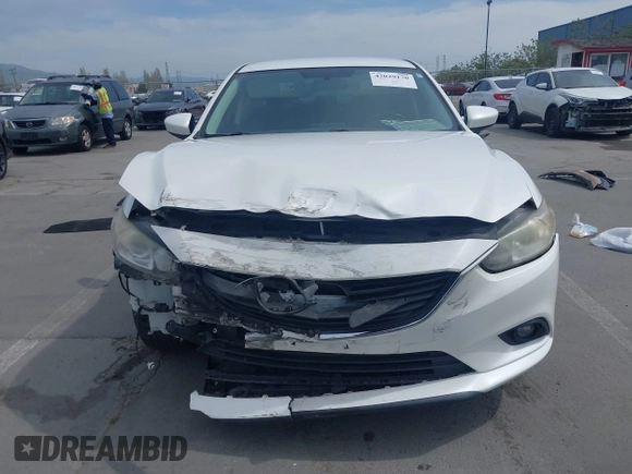 2016 Mazda Mazda6 i Touring with VIN JM1GJ1V57G1429887, listed as a IAAI auction lot 42029170 with 140,519 mi miles. Bid and sale history available at carsss.com. Image 12.