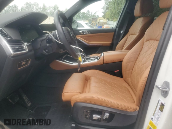 2023 BMW X5 xDrive45e with VIN 5UXTA6C08P9R00349, listed as a Copart auction lot 56510275 with 40,930 mi miles and Salvage title. Bid and sale history available at DreamBid. Image 7.