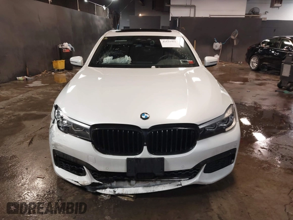 2019 BMW 7 Series 740i xDrive with VIN WBA7E4C59KGV70391, listed as a IAAI auction lot 41531991 with 70,017 mi miles and . Bid and sale history available at carsss.com. Image 12.