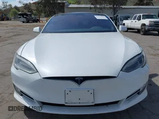 2018 Tesla Model S 75D with VIN 5YJSA1E22JF246928, listed as a IAAI auction lot 41869364 with 100,067 mi miles and . Bid and sale history available at DreamBid. Image 12.