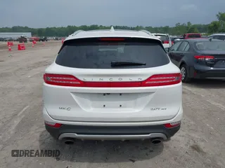 2017 Lincoln MKC Reserve with VIN 5LMCJ3D9XHUL55999, listed as a IAAI auction lot 42691155 with Not provided miles and . Bid and sale history available at DreamBid. Image 16.