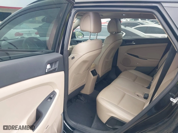 2017 Hyundai Tucson Value with VIN KM8J33A26HU362363, listed as a IAAI auction lot 41940376 with 127,986 mi miles. Bid and sale history available at carsss.com. Image 8.