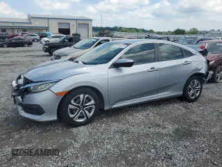2017 Honda Civic LX with VIN 2HGFC2F58HH571034, listed as a Copart auction lot 63146075 with 97,482 mi miles and Salvage title. Bid and sale history available at DreamBid. Image 1.