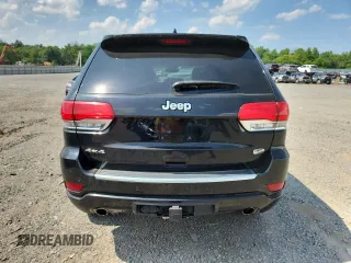 2017 Jeep Grand Cherokee Overland z VIN 1C4RJFCG4HC818132, wystawiony jako Copart lot #62642775 z przebiegiem 116 815 mil mil oraz Szkoda całkowita • Salvage title. Historia ofert i sprzedaży dostępna na DreamBid. Obrazek 6.