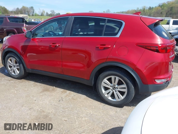 2018 Kia Sportage LX with VIN KNDPM3AC0J7445750, listed as a IAAI auction lot 41936557 with 122,268 mi miles and . Bid and sale history available at DreamBid. Image 3.