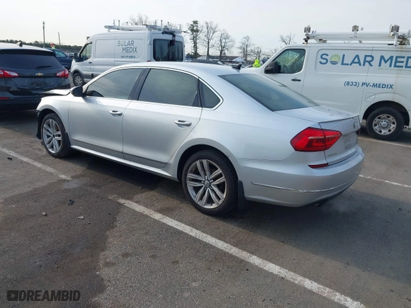2016 Volkswagen Passat 1.8T SEL with VIN 1VWCT7A3XGC018484, listed as a IAAI auction lot 41763388 with 123,484 mi miles. Bid and sale history available at carsss.com. Image 3.