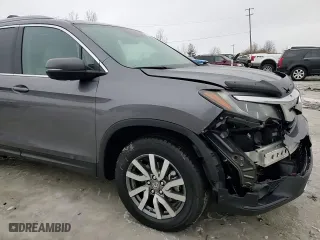2021 Honda Pilot EX-L with VIN 5FNYF6H59MB026057, listed as a Copart auction lot 43539565 with 98,044 mi miles and Salvage Title. Bid and sale history available at carsss.com. Image 12.