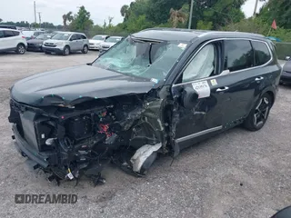 2023 Kia Telluride S z VIN 5XYP6DGC7PG405488, wystawiony jako IAAI lot #42135176 z przebiegiem 16 799 mil mil oraz . Historia ofert i sprzedaży dostępna na DreamBid. Obrazek 2.