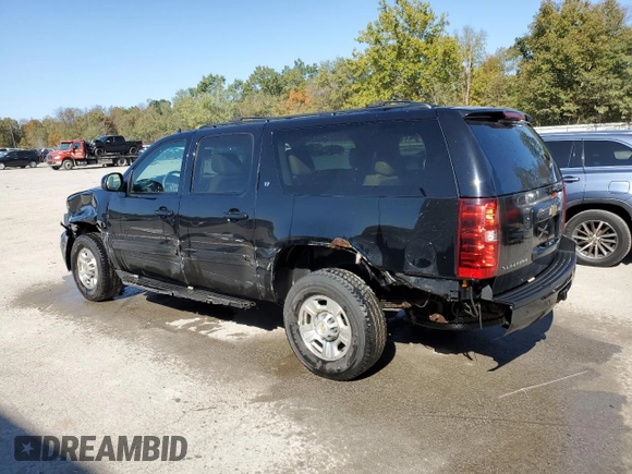 2013 Chevrolet Suburban with VIN 1GNWKMEG8DR213398, listed as a Copart auction lot 75192044 with 160,035 mi miles and Salvage title. Bid and sale history available at DreamBid. Image 2.