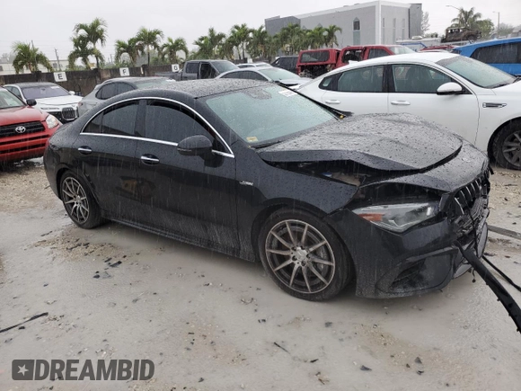 2023 Mercedes-Benz CLA 45 AMG with VIN W1K5J5DB9PN414523, listed as a Copart auction lot 52193645 with 27,492 mi miles and Salvage Title. Bid and sale history available at DreamBid. Image 4.