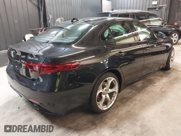 2021 Alfa Romeo Giulia Ti z VIN ZARFANBN7M7644482, wystawiony jako IAAI lot #42502199 z przebiegiem 27 962 mil mil oraz . Historia ofert i sprzedaży dostępna na DreamBid. Obrazek 4.