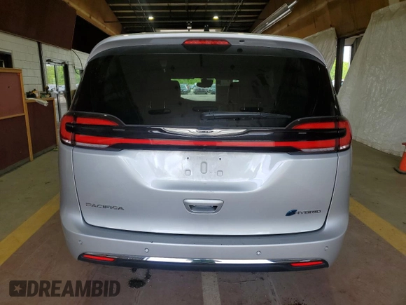 2024 Chrysler Pacifica Hybrid Select z VIN 2C4RC1S78RR150441, wystawiony jako Copart lot #55678105 z przebiegiem 26 612 mil mil oraz Tytuł czysty. Historia ofert i sprzedaży dostępna na DreamBid. Obrazek 6.