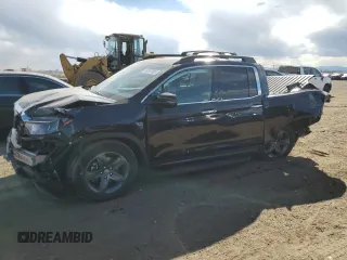 2023 Honda Ridgeline RTL-E with VIN 5FPYK3F71PB024149, listed as a Copart auction lot 50767465 with 40,943 mi miles and Salvage title. Bid and sale history available at DreamBid. Image 1.