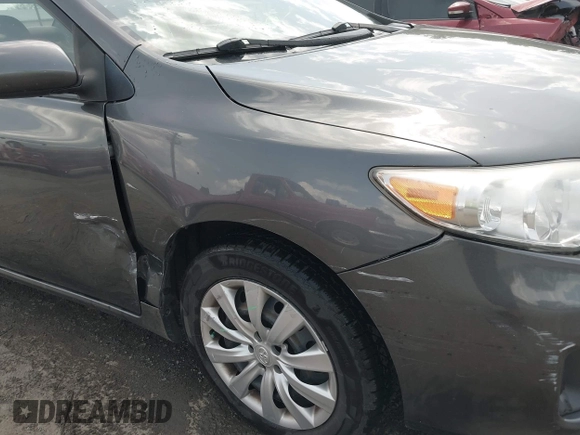 2012 Toyota Corolla L with VIN 2T1BU4EE1CC867992, listed as a IAAI auction lot 42155010 with 168,131 mi miles and . Bid and sale history available at DreamBid. Image 6.