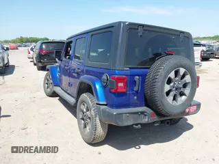 2018 Jeep Wrangler Unlimited Sahara z VIN 1C4HJXEN4JW321227, wystawiony jako IAAI lot #42002735 z przebiegiem 114 293 mil mil oraz . Historia ofert i sprzedaży dostępna na DreamBid. Obrazek 3.