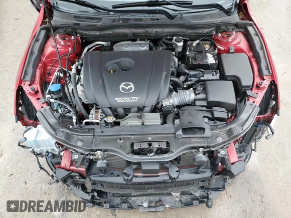 2018 Mazda 3 Touring z VIN 3MZBN1L39JM260754, wystawiony jako Copart lot #58514675 z przebiegiem 62 946 mil mil oraz Czysty tytuł • Clean title. Historia ofert i sprzedaży dostępna na DreamBid. Obrazek 12.