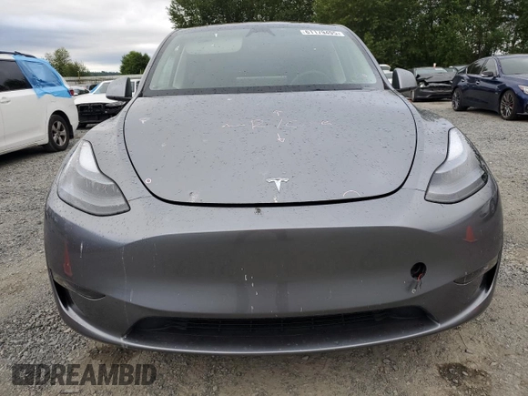 2024 Tesla Model Y Long Range with VIN 7SAYGDEE1RF159332, listed as a Copart auction lot 61179495 with 9,259 mi miles and Salvage title. Bid and sale history available at DreamBid. Image 5.