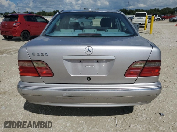 2002 Mercedes-Benz E-Class with VIN WDBJF65J02B495961, listed as a Copart auction lot 73844554 with 99,380 mi miles and Salvage Title. Bid and sale history available at carsss.com. Image 6.