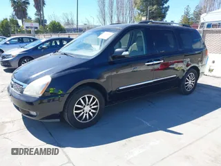 2012 Kia Sedona EX with VIN KNDMH4C75C6425709, listed as a IAAI auction lot 41879455 with 201,086 mi miles. Bid and sale history available at carsss.com. Image 2.