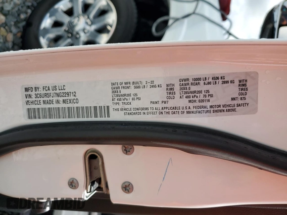 2022 Ram 2500 Laramie z VIN 3C6UR5FJ7NG229712, wystawiony jako Copart lot #51058115 z przebiegiem 36 094 mil mil oraz Szkoda całkowita • Salvage title. Historia ofert i sprzedaży dostępna na DreamBid. Obrazek 12.