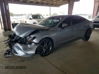 2016 Mazda 6 i Grand Touring с VIN JM1GJ1W52G1486688, выставлен на аукционе Copart как лот 53187695 с пробегом 101 119 миль миль и Списание • Salvage title. История ставок и продаж доступна на DreamBid. Изображение 1.