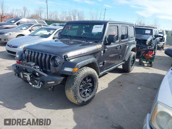 2020 Jeep Wrangler Unlimited Sport S z VIN 1C4HJXDN3LW155884, wystawiony jako IAAI lot #41868363 z przebiegiem 82 901 mil mil oraz . Historia ofert i sprzedaży dostępna na DreamBid. Obrazek 17.