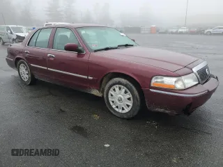 2005 Mercury Grand Marquis GS with VIN 2MEFM74W05X604628, listed as a Copart auction lot 51332335 with 165,224 mi miles and Salvage Title. Bid and sale history available at DreamBid. Image 4.