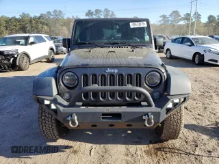 2014 Jeep Wrangler Unlimited Rubicon with VIN 1C4BJWFG4EL256824, listed as a Copart auction lot 49473815 with 117,264 mi miles and Salvage Title. Bid and sale history available at carsss.com. Image 5.