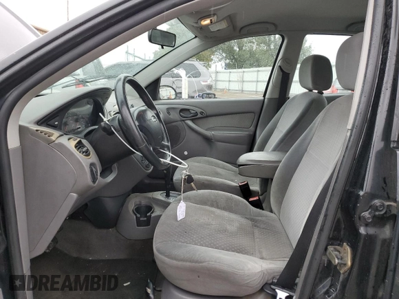 2003 Ford Focus ZTS with VIN 1FAFP38383W181376, listed as a Copart auction lot 75478074 with 179,142 mi miles and Salvage Title. Bid and sale history available at carsss.com. Image 7.