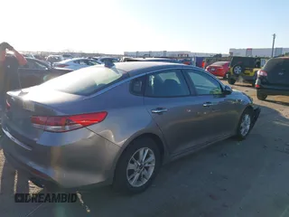 2016 Kia Optima LX with VIN 5XXGT4L39GG102599, listed as a IAAI auction lot 41748147 with 104,712 mi miles. Bid and sale history available at carsss.com. Image 4.