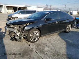 2019 Honda Clarity Plug-In Hybrid with VIN JHMZC5F19KC002776, listed as a Copart auction lot 42864015 with 102,227 mi miles and Salvage Title. Bid and sale history available at carsss.com. Image 1.