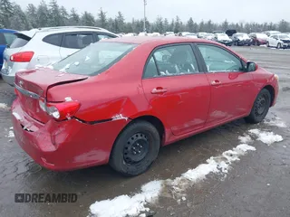 2012 Toyota Corolla L with VIN 2T1BU4EE4CC885807, listed as a IAAI auction lot 41988950 with 209,820 mi miles. Bid and sale history available at carsss.com. Image 4.