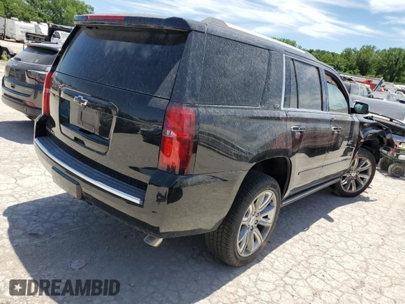 2015 Chevrolet Tahoe LTZ z VIN 1GNSKCKC8FR506151, wystawiony jako Copart lot #59948174 z przebiegiem Nie podano mil oraz Szkoda całkowita • Salvage title. Historia ofert i sprzedaży dostępna na DreamBid. Obrazek 3.
