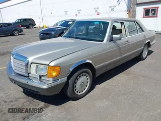 1989 Mercedes-Benz 560 with VIN WDBCA39D7KA436793, listed as a IAAI auction lot 42190980 with 141,165 mi miles and . Bid and sale history available at DreamBid. Image 2.