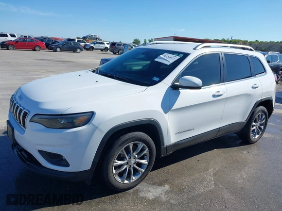 2021 Jeep Cherokee Altitude with VIN 1C4PJLLB5MD173828, listed as a IAAI auction lot 42234912 with 66,400 mi miles and . Bid and sale history available at DreamBid. Image 2.