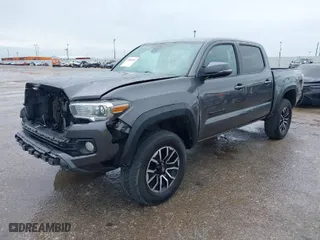 2021 Toyota Tacoma 2WD SR5 with VIN 5TFAZ5CNXMX097509, listed as a IAAI auction lot 41889399 with 81,598 mi miles. Bid and sale history available at carsss.com. Image 2.