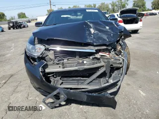 2015 Ford Taurus SEL with VIN 1FAHP2E86FG130511, listed as a Copart auction lot 60545805 with 99,215 mi miles and Salvage title. Bid and sale history available at DreamBid. Image 5.