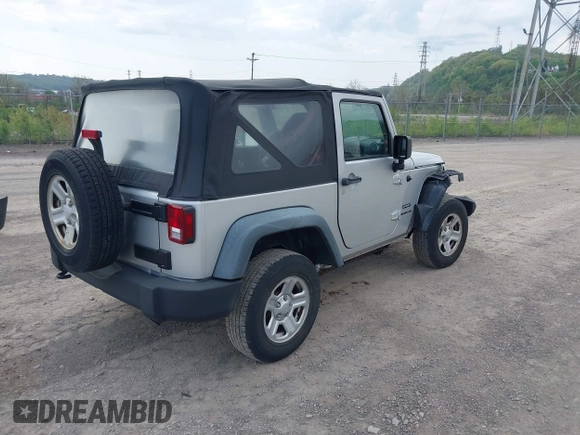2011 Jeep Wrangler Sport with VIN 1J4AA2D18BL546069, listed as a IAAI auction lot 42139693 with 56,395 mi miles and . Bid and sale history available at carsss.com. Image 4.
