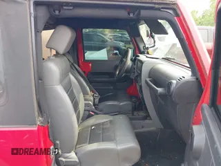 2009 Jeep Wrangler X with VIN 1J4FA24129L716085, listed as a IAAI auction lot 42425012 with 118,859 mi miles and . Bid and sale history available at DreamBid. Image 5.