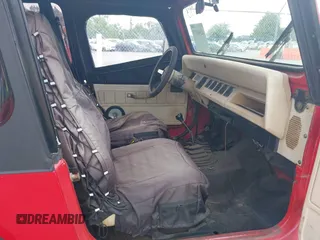 1991 Jeep Wrangler with VIN 2J4FY19P7MJ132895, listed as a IAAI auction lot 42541973 with 169,999 mi miles and . Bid and sale history available at DreamBid. Image 5.