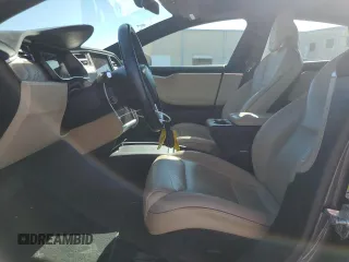 2017 Tesla Model S 60 with VIN 5YJSA1E14HF184188, listed as a Copart auction lot 55836495 with 94,623 mi miles and Salvage title. Bid and sale history available at DreamBid. Image 7.