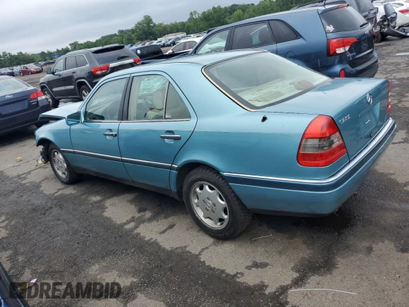 1994 Mercedes-Benz C 230/260/280/320 with VIN WDBHA28E8RF098148, listed as a Copart auction lot 60884345 with 238,600 mi miles and Salvage title. Bid and sale history available at DreamBid. Image 2.